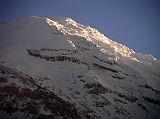 Ecuador Chimborazo 05-01 Estrella del Chimborazo Chimborazo Main Summit Close Up At Sunrise When we awoke early the next day, the mists had cleared and Chimborazo shone beautifully in the early morning sun from the Estrella del Chimborazo. Heres a close up of glaciers and the Whymper (6310m, Main) summit of Chimborazo at sunrise.